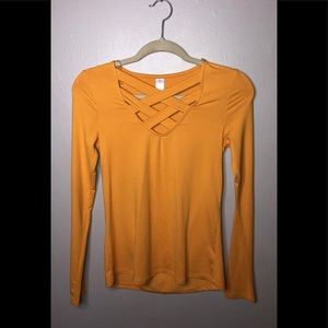 Cute tight shirt yellow and burgundy.